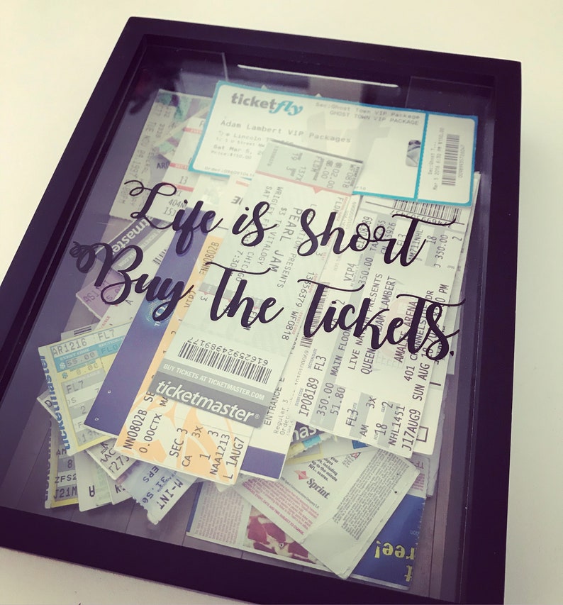 Black concert ticket memory box with sample tickets inside; tickets are not included