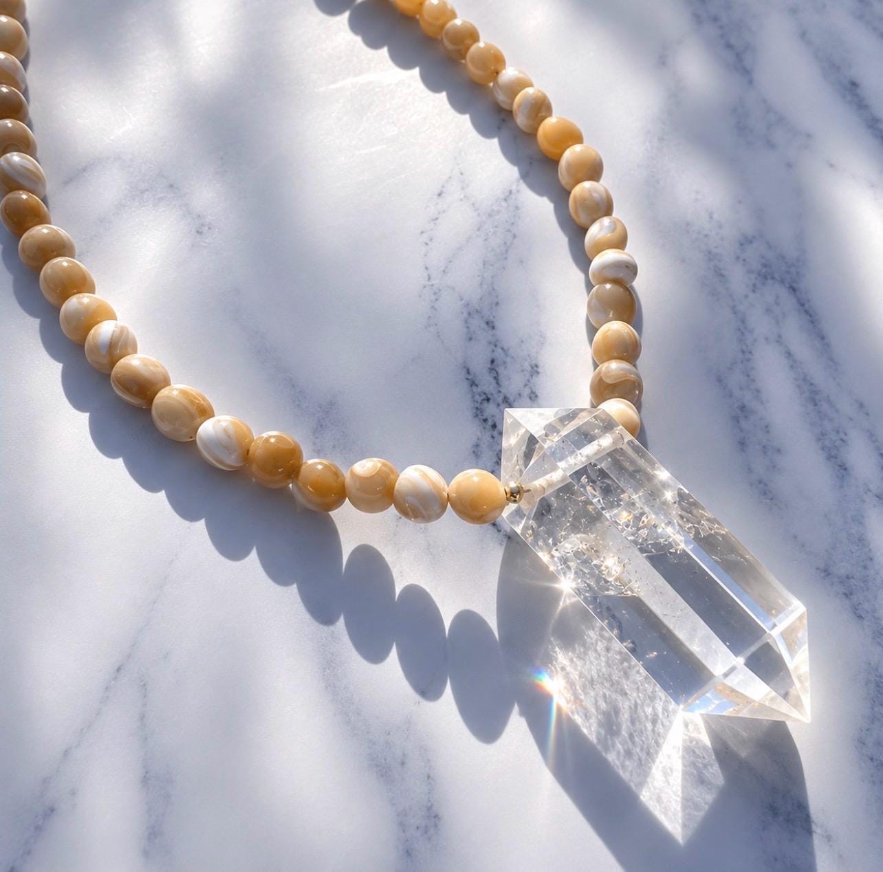 Earth, Water & Light Talisman Necklace- Trochus Shell and AAA Quartz
