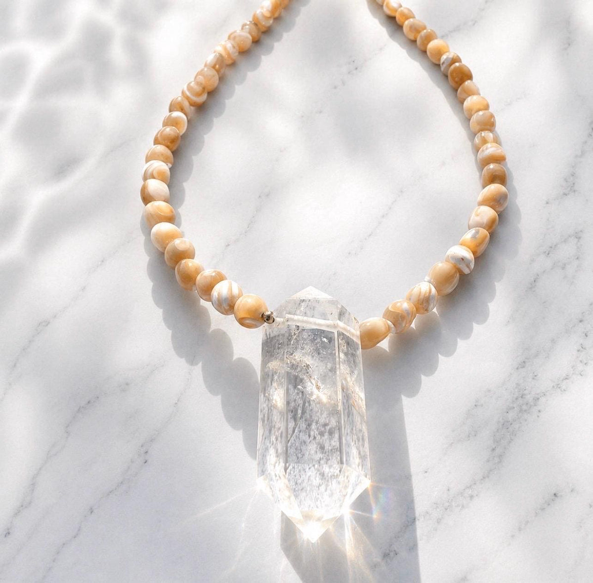 Earth, Water & Light Talisman Necklace- Trochus Shell and AAA Quartz