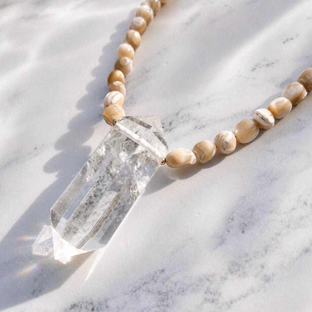 Earth, Water & Light Talisman Necklace- Trochus Shell and AAA Quartz