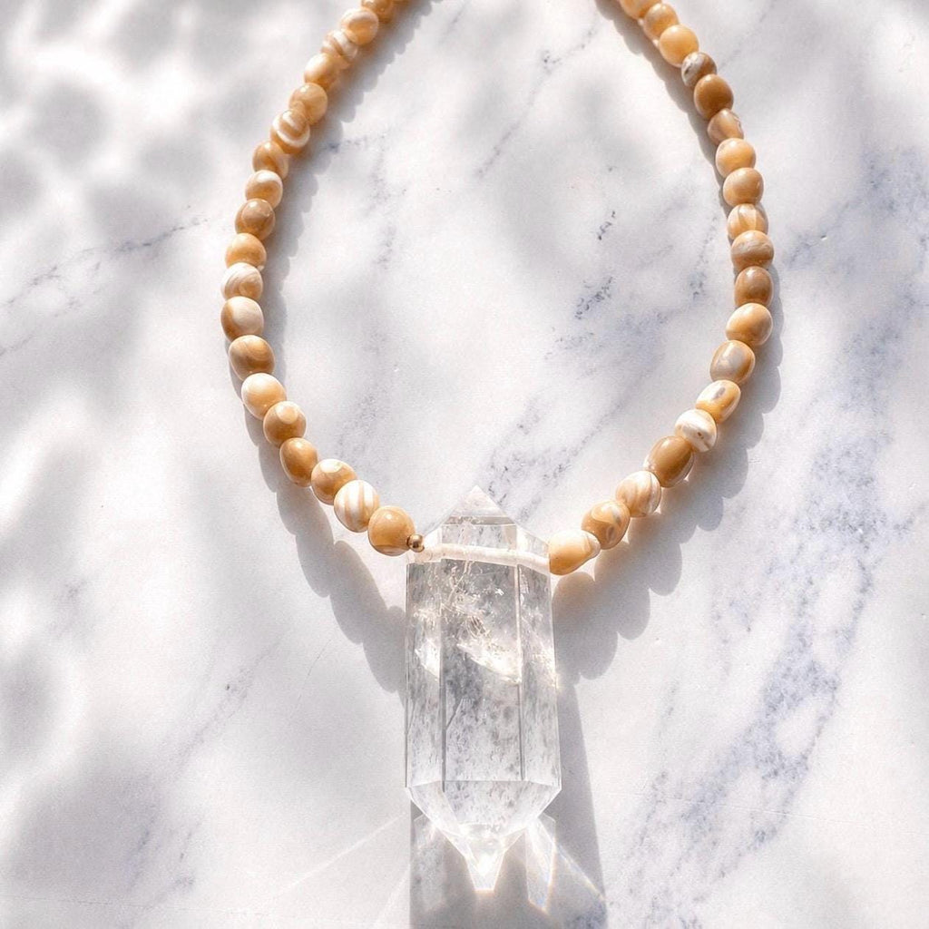 Earth, Water & Light Talisman Necklace- Trochus Shell and AAA Quartz